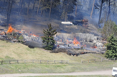 Figure 9.34: The remains of a home destroyed by Colorado’s Black Forest Fire on June 12, 2013.