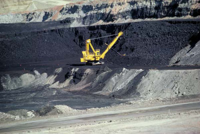 Figure 7.7: Coal mining in Wyoming. Mining of thick sub-bituminous coal beds in the Paleocene Fort Union and other formations make Wyoming the largest coal-producing state in America.