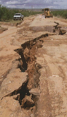 Figure 9.10: This giant desiccation crack appeared in a road in Graham County, southeastern Arizona. Such cracks typically occur as a network of polygonal fissures.