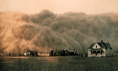 Figure 10.30: A dust storm approaching the town of Stratford, Texas during the Dust Bowl in 1935.
