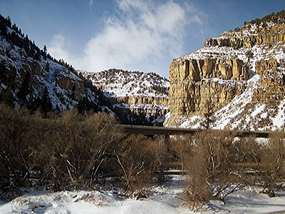 Figure 2.32: Cambrian and Ordovician strata are exposed in Glenwood Canyon, Colorado, where Interstate Highway I-70 follows the Colorado River.