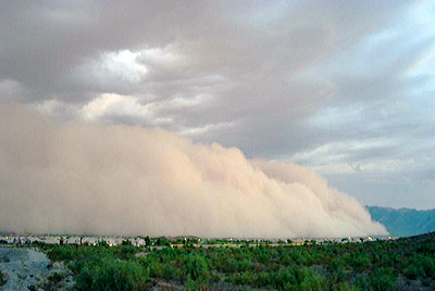 Figure 9.32: A haboob blows into the village of Ahwatukee, part of Phoenix, Arizona, in August 2003.