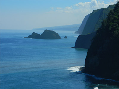 Figure 4.18: Cliffs on windward Kohala, Hawai’i, viewed looking SE from Pololū valley. Most Hawaiian sea cliffs are the head scarps of mega-landslides.