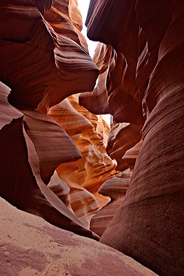 Figure 4.10: Lower Antelope Canyon (The Corkscrew), Arizona, a slot canyon characterized by the flowing spiral shape of its walls. The canyon was formed by erosion of the Navajo Sandstone due to flash flooding.