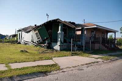 Figure 10.23: This house in New Orleans was destroyed when it floated off its foundation during the 2005 flood.