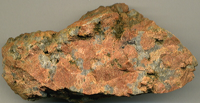 Figure 2.31: Coarsely crystalline granite (approximately 1.8 billion years old) from the Pike’s Peak batholith in central Colorado. This pegmatite is dominated by feldspar, quartz, and mica.