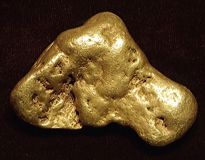 Figure 5.19: A nugget of placer gold from Pennsylvania Mountain in the Alma Mining District, Park County, Colorado. This is Colorado’s largest known gold nugget, weighing in at 373 grams (12 troy ounces).
