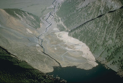 Figure 10.12: The landslide dam that led to the formation of Quake Lake (also known as Earthquake Lake). Today, the lake is 58 meters (190 feet) deep and 10 kilometers (6 miles) long.