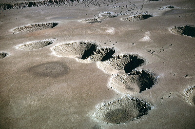 Figure 9.20: Aerial view of large aligned sinkholes in the Permian Kaibab Formation, southeast of Winslow, Arizona.