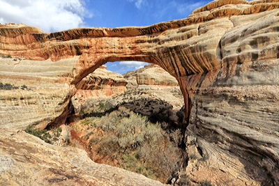 Figure 2.7: Sipapu Natural Bridge, formed from Cedar Mesa Sandstone in Natural Bridges National Monument, Utah. Note the cross-bedding at lower right.